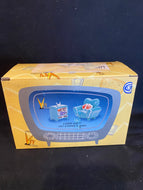 BLUE CHAIR AND TV SALT AND PEPPER